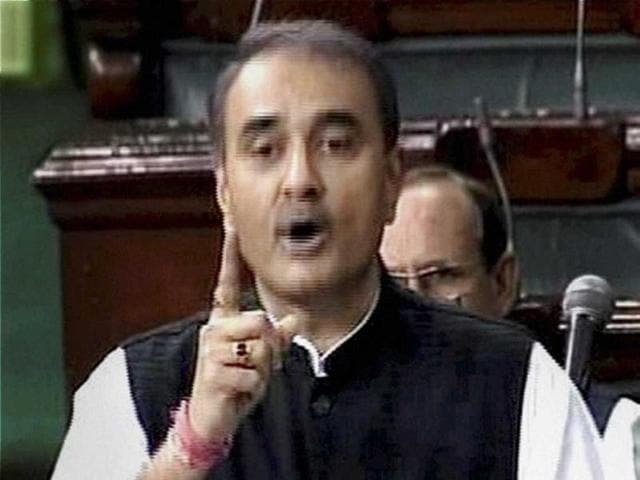 Union Minister for Heavy Industries and Public Enterprises Praful Patel speaks during a debate on FDI in Lok Sabha in New Delhi. PTI Photo/TV grab