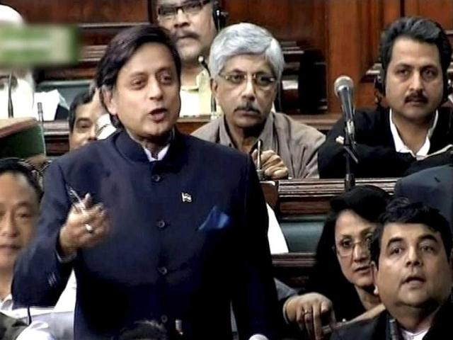 MoS for HRD Shashi Tharoor speaks during a debate on FDI in Lok Sabha in New Delhi. PTI Photo/TV grab