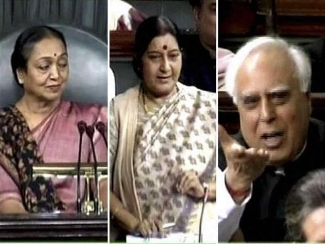 Speaker Meira Kumar, Leader of Opposition Sushma Swaraj and Communications and IT MInister Kapil Sibal in Lok Sabha in New Delhi. PTI Photo/TV grab