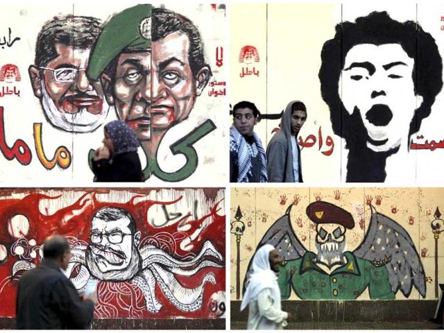 Combination photograph of murals drawn on the wall of the presidential palace in Cairo. Egypt's military, stepping into a crisis pitting Islamist President Mohamed Mursi against opponents who accuse him of grabbing excessive power, said only dialogue could avert "catastrophe". (Reuters Photo)