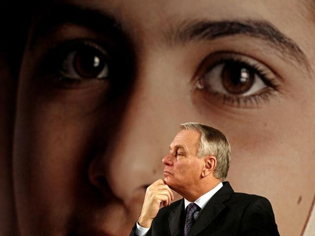 French Prime Minister Jean-Marc Ayrault attends the event "Stand up for Malala, Girls' education is a right!" during the United Nations Human Rights Day at the UNESCO headquarters in Paris. REUTERS/Charles Platiau