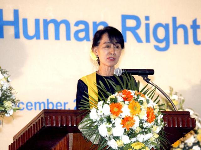 Myanmar opposition leader Aung San Suu Kyi speaks during a ceremony to mark International Human Rights Day in Yangon, Myanmar. (AP Photo/Khin Maung Win)