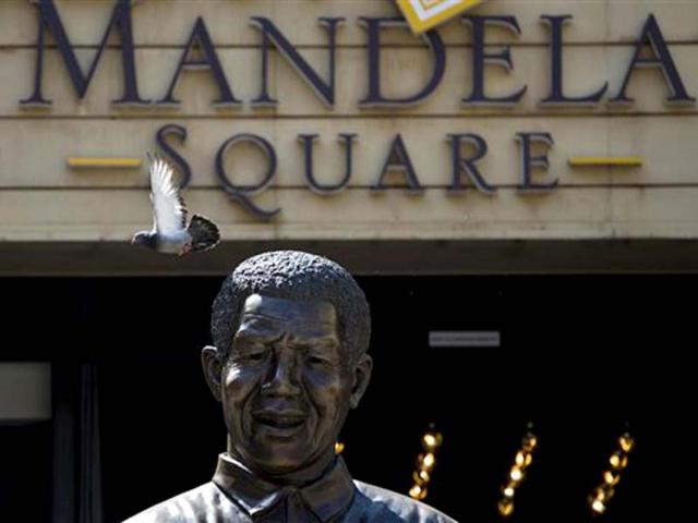 A giant statue of former president Nelson Mandela at the Sandton shopping center in Johannesburg. (AP file photo)