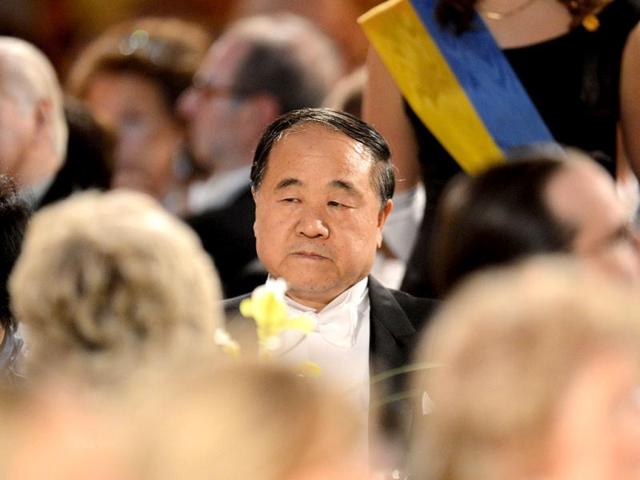 The 2012 Nobel Literature Prize winner Mo Yan of China is pictured during the Nobel Banquet, a traditional dinner, after the Nobel Prize awarding ceremony at the Stockholm City Hall. The winners of the Nobel Prize 2012 in the categories of medicine, physics, chemistry, literature and economics received their awards from the hands of Sweden's King Carl XVI Gustaf at a formal ceremony, followed by a gala banquet. AFP PHOTO/JONATHAN NACKSTRAND