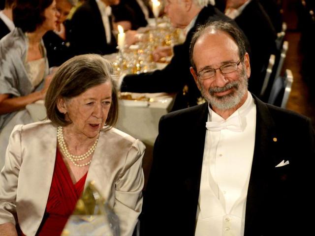 The 2012 Nobel Literature Prizewinner Economics Alvin E Roth (R) reacts during the Nobel Banquet, a traditional dinner after the Nobel Prize awarding ceremony at the Stockholm City Hall, Sweden. AFP PHOTO/JONATHAN NACKSTRAND