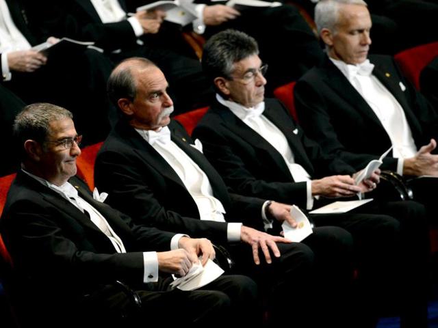 (1st row L-R) The Nobel 2012 laureates in physics Serge Haroche of France, David Wineland of US, the Nobel 2012 Chemistry laureates Robert J Lefkowitz and Brian K Kobilka attend the Nobel prize awarding ceremony in Stockholm. AFP PHOTO/JONATHAN NACKSTRAND