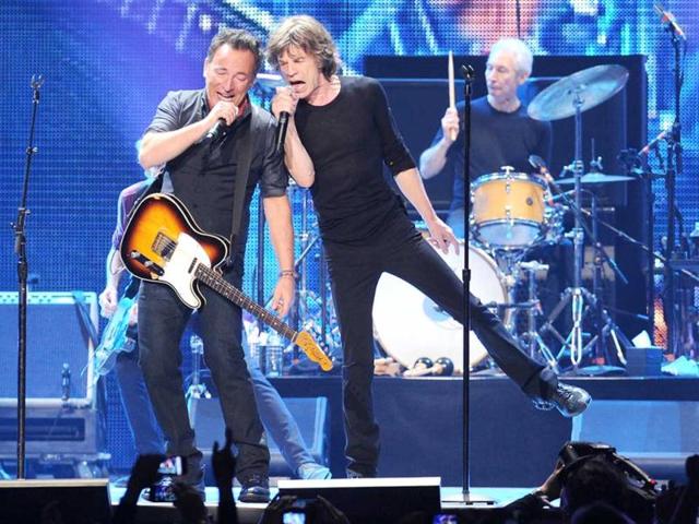 Musician Bruce Springsteen, left, performs with Mick Jagger during the Rolling Stones final concert of their "50 and Counting Tour" in Newark, New Jersey. (AP Photo)