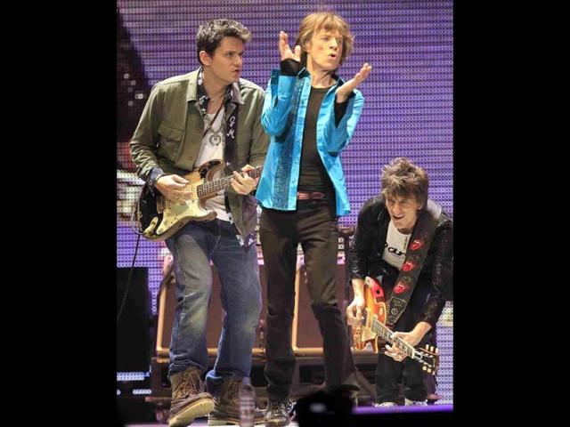 (L -R)John Mayer, Mick Jagger and Ronnie Wood perform onstage during the Rolling Stones final concert of their "50 and Counting Tour" in Newark, New Jersey. (Reuters)