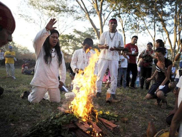 Mayan shamans perform a ceremony for the celebration for the upcoming end - December 21 - of the Maya cycle known as Bak'tun 13 and the start of the new Maya Era, at the Cihuatan Archeological Site in the town of Aguilares near El Salvador. AFP photo