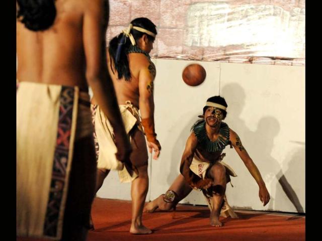 Honduras Maya Chorti and Guatemala´s Quirigua vie for the ball in Copan Ruinas. The ancient Mayan ball game is part of celebrations that will finish next December 21, when the current 5200-year cycle comes to an end and a new era begins in the Mayan calender. According to historians, the Mayan ball game was a form of ritual, where the loser was sacrificed. AFP photo