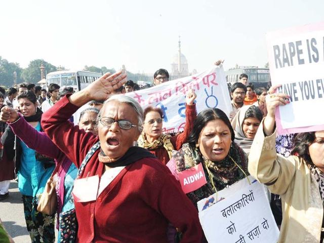Members of the All India Democratic Women's Association raising slogans during their march to President House to submit a memorandum for strict action against the gangrape culprits in New Delhi. UNI