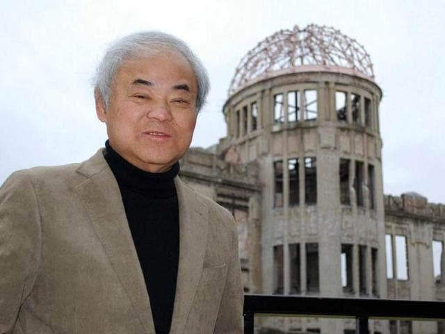 Nakazawa-standing-in-front-of-the-atomic-bomb-dome-in-Hiroshima-in-western-Japan-Nakazawa-a-Hiroshima-atomic-bomb-survivor-whose-iconic-comic-strip-about-the-incident-was-read-by-millions-of-school-children-in-post-war-Japan-has-died-Photo-AFP-JIJI-Press