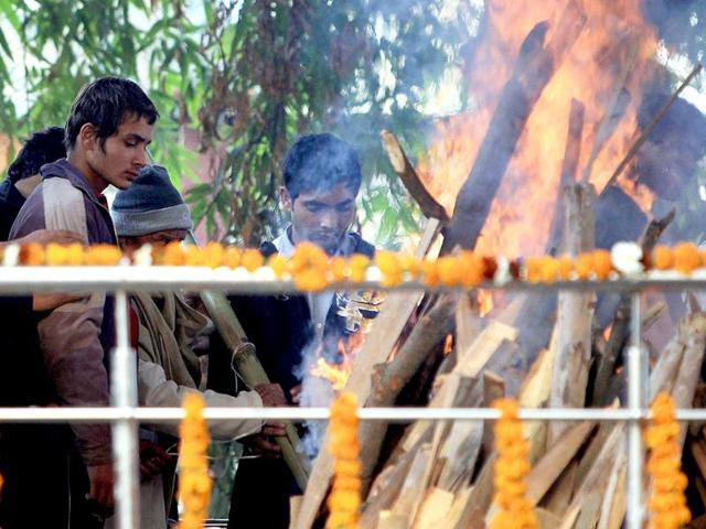 Cremation of police constable Subhash Chand Tomar being performed in New Delhi. Tomar, who was hospitalized after tackling gangrape protesters at India Gate, died of a cardiac arrest. PTI