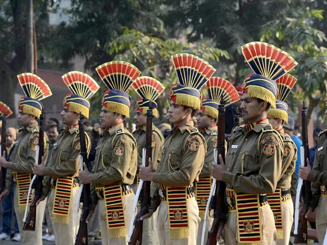 Policemen stand in formation as they pay their last respects for their fallen comrade Subash Tomar during his funeral in New Delhi. AFP/Sajjad Hussain