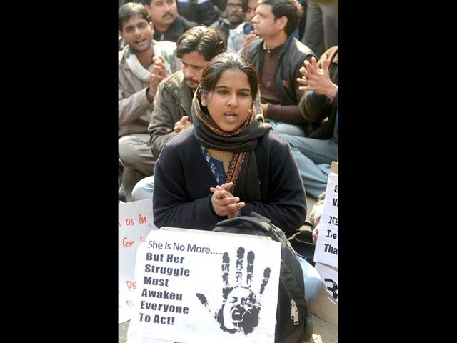Protesters hold placards as they shout slogans during a protest demanding better security for women in New Delhi. (AFP Photo)