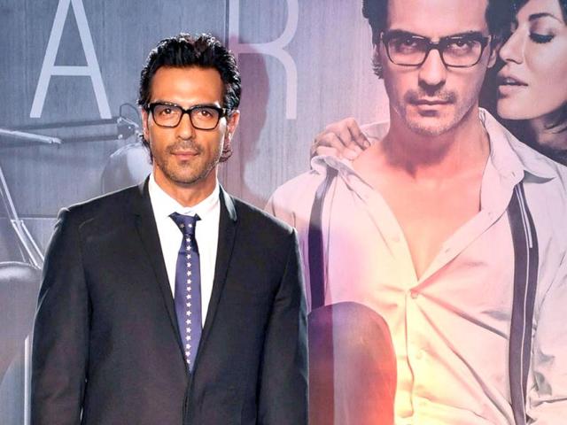 Arjun Rampal looks a top notch corporate executive as he poses against his Inkaar poster.