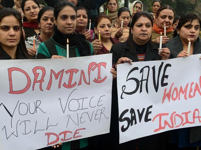 A-protestor-holds-a-placard-during-a-protest-in-Mumbai-to-mourn-the-death-of-a-gangraped-student-in-New-Delhi-The--student-became-the-focus-of-nationwide-protests-AFP-Photo