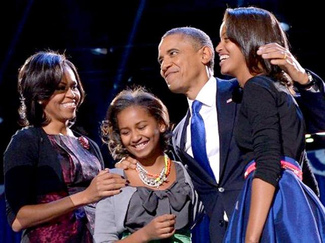 US-President-Barack-Obama-with-First-Lady-Michelle-and-daughters-Sasha-and-Malia-AFP-Jewel-Samad US-President-Barack-Obama-with-First-Lady-Michelle-and-daughters-Sasha-and-Malia-AFP-Jewel-Samad