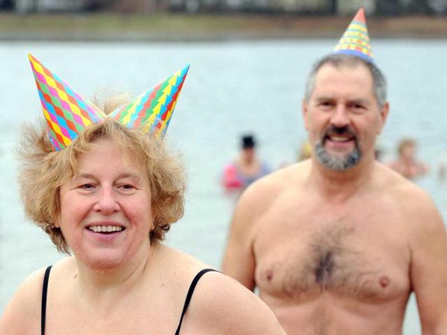 Winter bathers of the "Berlin Seals" attend a New Year's swimming event at the Orankesee lake in Berlin. AFP Photo