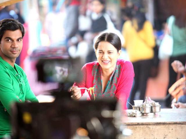 Kangna Ranaut laughing as she shoots for Queen in Delhi. Queen is her upcoming movie.