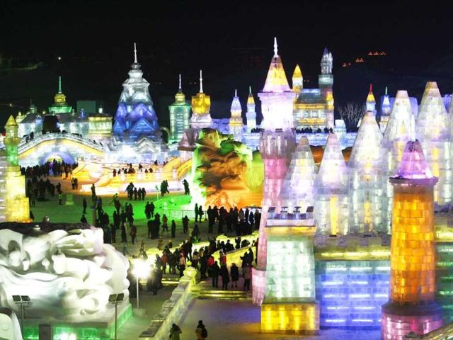 This picture tshows colorful ice castles in Ice and Snow World at the opening ceremony of the 2013 Harbin International Ice and Snow Festival. Despite freezing temperatures, visitors flocked to the opening of Ice and Snow World, the best-known winter theme park in China. (AFP Photo)