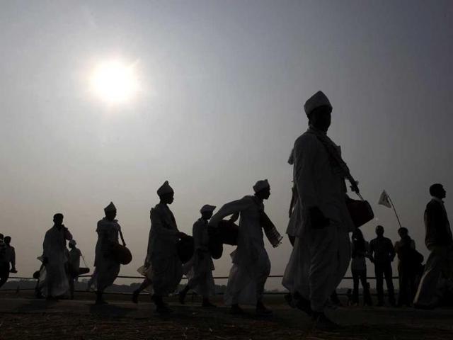 People play the khol, a traditional percussion instrument of Assam, as they participate in an attempt to create a Guinness record, in Titabar, about 350 kilometers east of Guwahati. AP/Anupam Nath