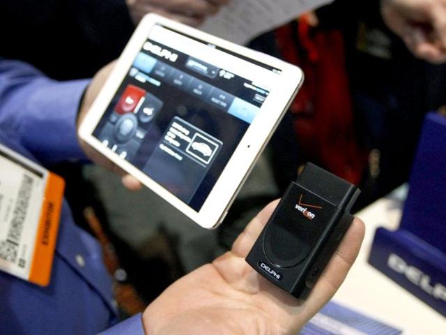 The keyfob emulator screen for the Delphi Connected Car app is seen at the opening press event of the Consumer Electronics Show (CES) in Las Vegas. The app plugs into a cars OBD II port and connects to the cellular data network allowing remote viewing of where the car is, how fast it's going and remote start and unlock capability. (Reuters)