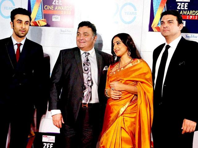 Bollywood actors Ranbir Kapoor and Rishi Kapoor with Vidya Balan and her husband Siddharth Roy Kapur, CEO, UTV Motion Pictures, at Zee Cine Awards 2013. (PTI Photo)