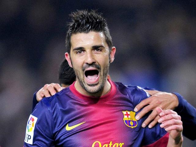 FC Barcelona's David Villa reacts after scoring against Cordoba during a Copa del Rey soccer match at the Camp Nou stadium in Barcelona, Spain. (AP Photo)
