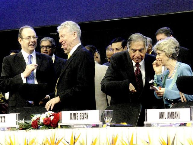 Ratan Tata meeting other delegates at the inaugural function of Vibrant Gujarat Investor Summit 2013 at Mahatma Mandir in Gandhinagar. UNI photo