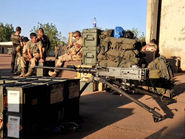 French soldiers from the 2nd RIMA (French Navy Infantry Regiment), arriving from France, prepare at the 101 military airbase in Bamako before their deployment in the north of Mali. AFP Photo