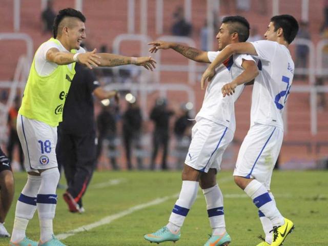 Chile's Nicolas Maturana (C) celebrates with teammates after scoring against Paraguay during an U-20 South American soccer championship match in Mendoza, Argentina. AP