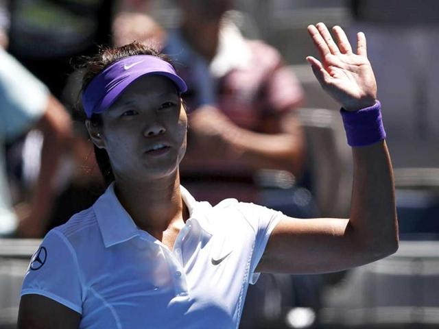 Li Na of China celebrates defeating Olga Govortsova of Belarus in their women's singles match at the Australian Open tennis tournament in Melbourne. Reuters