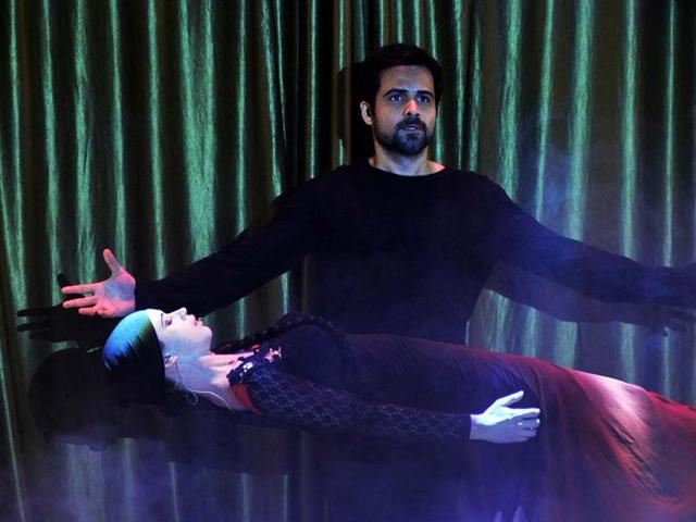 Bollywood film actors Emraan Hashmi (back) and Kalki Koechlin perform at the launch of the 'first look' of Ek Thi Daayan produced by Ekta Kapoor and Vishal Bhardwaj on January 16, 2013. (AFP PHOTO)