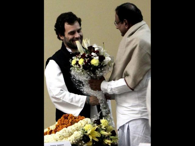 Rahul Gandhi is greeted by finance minister P Chidambaram after he was appointed as vice president of the Congress party in Jaipur. PTI Photo