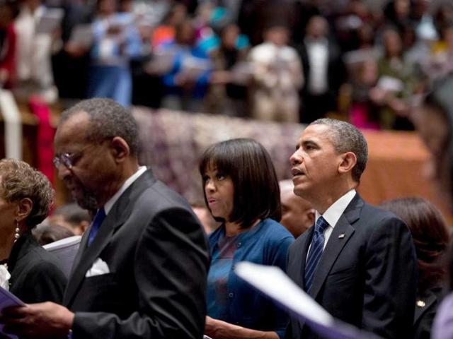This image, released by the White House, shows US President Barack Obama and First Lady Michelle Obama attend a church service at Metropolitan African Methodist Episcopal Church in Washington, D.C., on Inauguration Day. AFP Photo