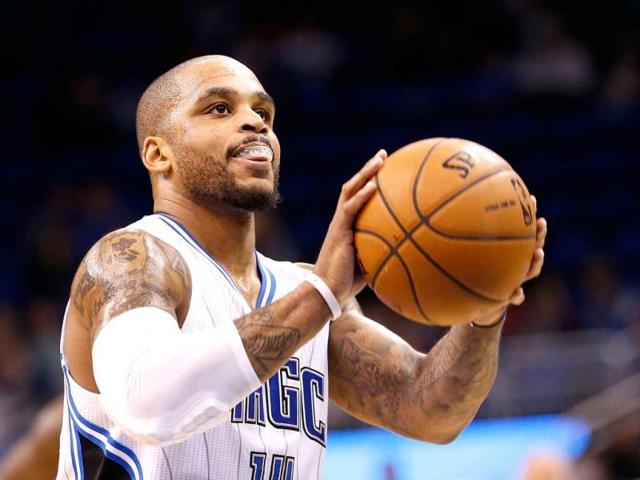 Jameer Nelson #14 of the Orlando Magic attempts a free throw during the game against the Dallas Mavericks at Amway Center in Orlando, Florida. AFP Photo