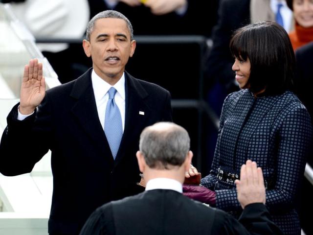 US President Barack Obama takes the oath of office during the 57th Presidential inauguration ceremonial swearing-in at the US Capitol in Washington. (AFP Photo)