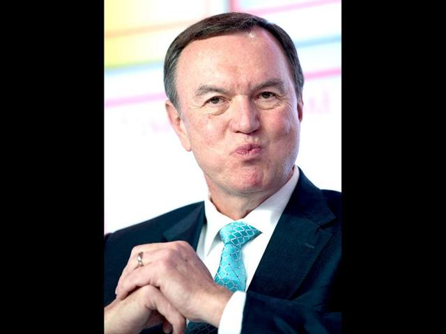 Mike Duke, President and CEO of Wal-Mart Stores, attends a discussion panel during the 2013 World Economic Forum Annual Meeting on at the Swiss resort of Davos. AFP photo