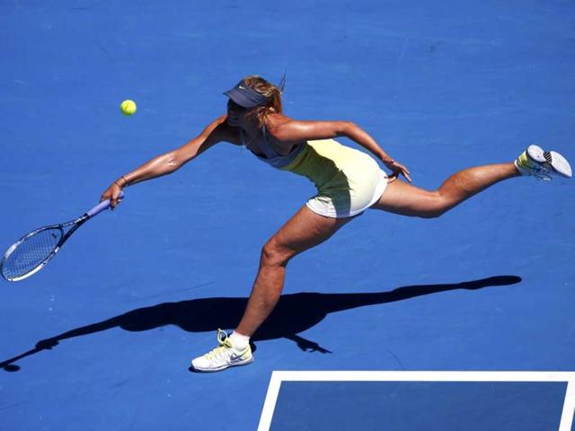 Maria Sharapova of Russia hits a return to Li Na of China during their women's singles semi-final match at the Australian Open tennis tournament in Melbourne. Reuters