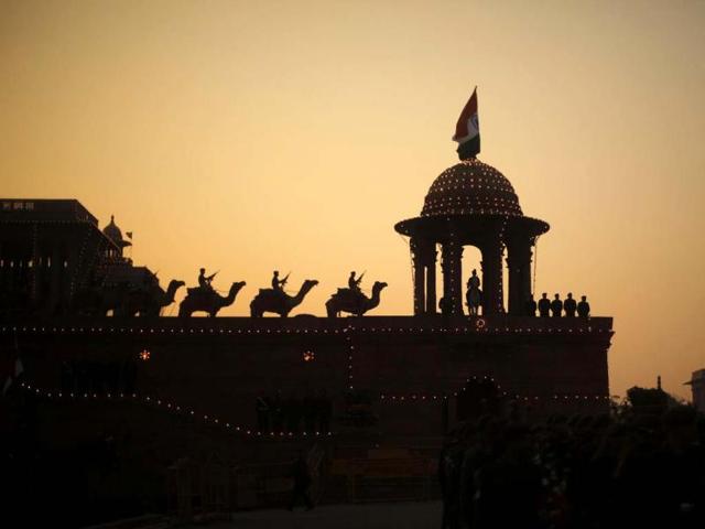 Border Security Force (BSF) soldiers ride their camels during a rehearsal for the "Beating the Retreat" ceremony in New Delhi. Reuters/UNI