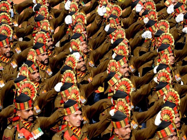 Soldiers march down the ceremonial boulevard Rajpath during the Republic Day parade in New Delhi. AFP Photo