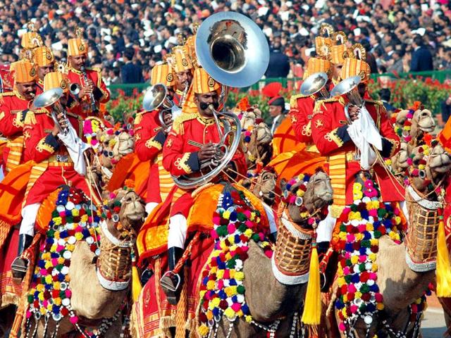 The first BSF band performing on a camel's back passing through the saluting dais at Rajpath during the Republic Day parade in New Delhi.