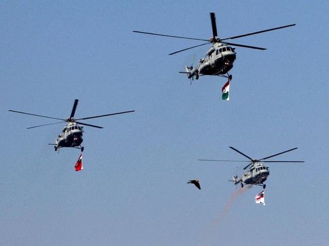 IAF's MI-17 V5 helicopters flying past during 64th Republic Day celebrations in New Delhi. PTI Photo