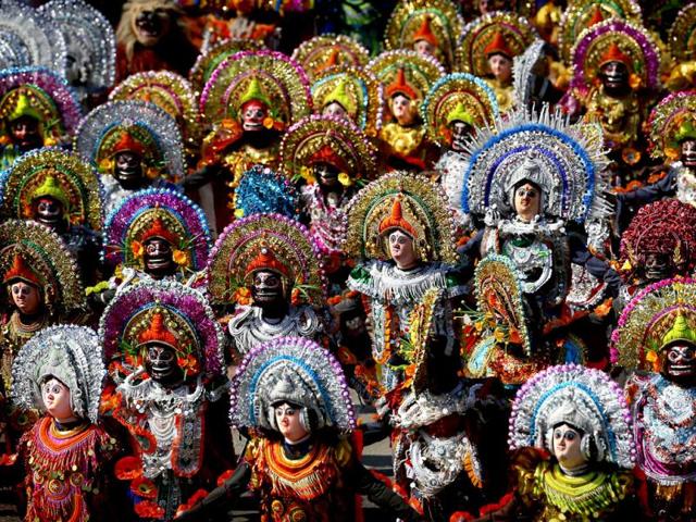 Students dressed in traditional clothing perform a Purulia Chhau dance during the annual Republic Day parade on Rajpath in New Delhi. AP Photo