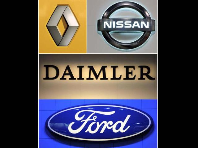 A-combo-made-on-January-28-2013-shows-the-logos-of-carmakers-Renault-L-Nissan-R-Daimler-C-and-Ford-The-Franco-Japanese-automakers-Renault-Nissan-said-on-January-28-2013-that-they-have-signed-a-deal-with-Daimler-and-Ford-jointly-to-develop-a-fuel-cell-which-would-equip-electric-cars-from-2017-The-three-groups-plan-to-hold-equal-shares-in-the-project-and-expect-to-launch-the-first-large-scale-production-of-affordable-fuel-cell-powered-vehicles-in-2017-a-statement-said-Photo-AFP A-combo-made-on-January-28-2013-shows-the-logos-of-carmakers-Renault-L-Nissan-R-Daimler-C-and-Ford-The-Franco-Japanese-automakers-Renault-Nissan-said-on-January-28-2013-that-they-have-signed-a-deal-with-Daimler-and-Ford-jointly-to-develop-a-fuel-cell-which-would-equip-electric-cars-from-2017-The-three-groups-plan-to-hold-equal-shares-in-the-project-and-expect-to-launch-the-first-large-scale-production-of-affordable-fuel-cell-powered-vehicles-in-2017-a-statement-said-Photo-AFP