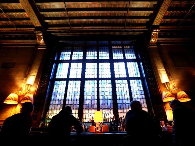 People gather at the Campbell Apartment at Grand Central Terminal during celebrations on the day the famed Manhattan transit hub turns 100 years old in New York City. AFP/Mario Tama/Getty Images