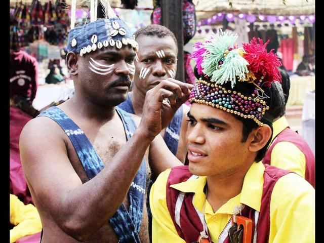 Folk artists at the inauguration of the Surajkund International Crafts Mela at Surajkund, Haryana. PTI