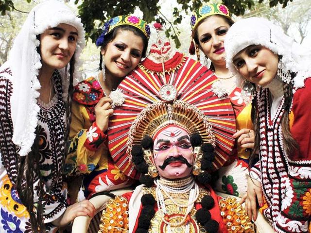 A group of folk artists at the inauguration of the Surajkund International Crafts Mela at Surajkund, Haryana. PTI