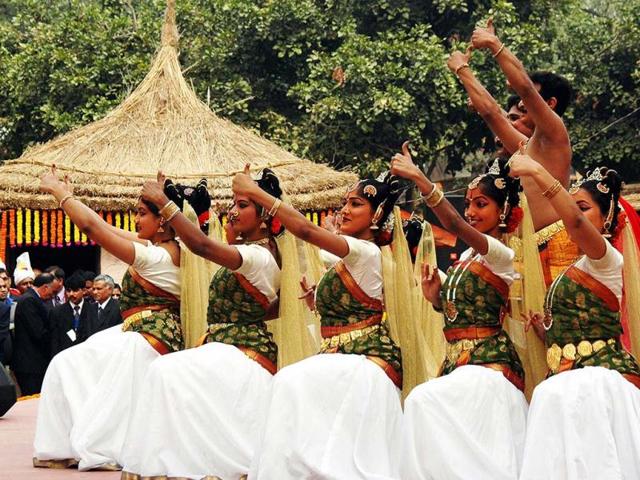 Folk artistes perform at the inauguration of the Surajkund International Crafts Mela at Surajkund in Haryana. UNI